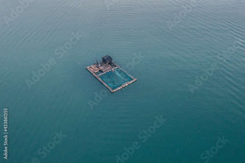 Aerial view of a fishing raft farm on the sea