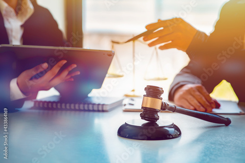 Cuadro en lienzo Legal law, advice and justice concept,Business lawyer working about legal legislation in courtroom to help their customer