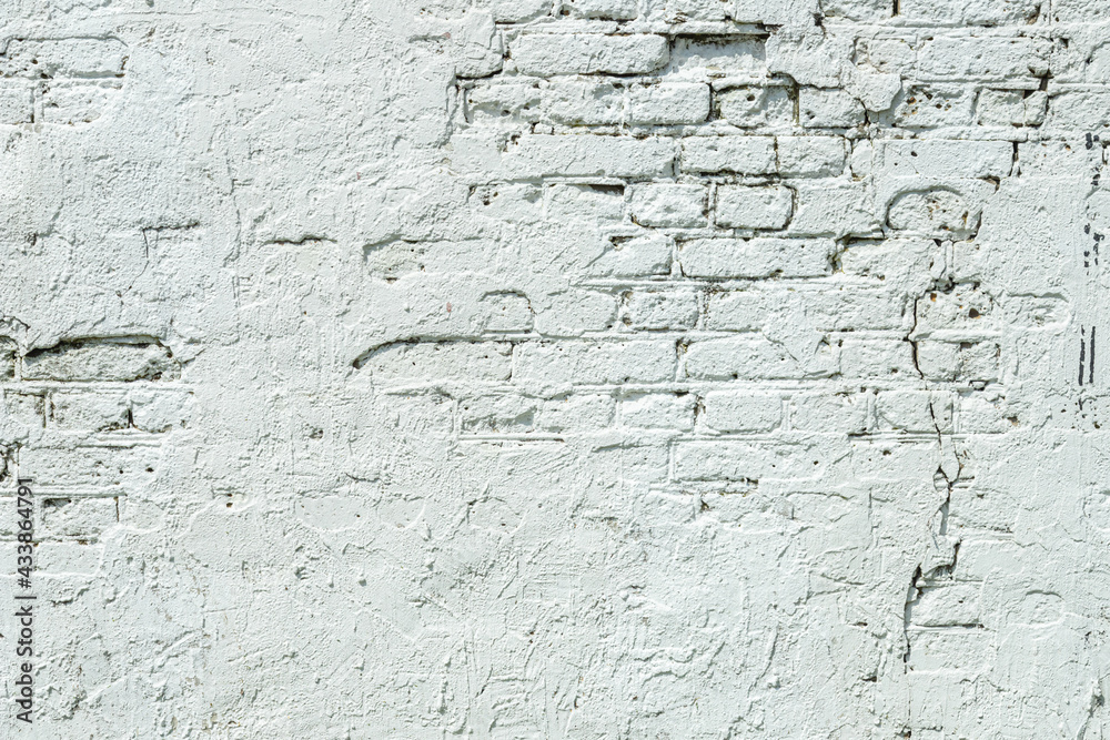 Aged white brick wall background Aged white brick wall background