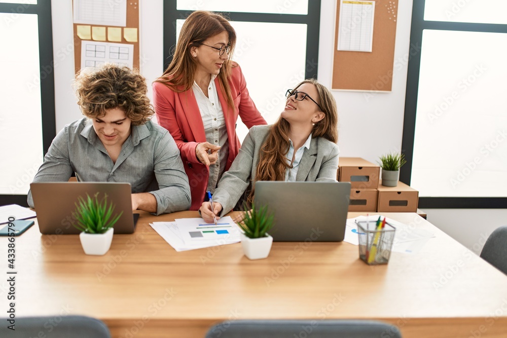 Group of business workers working at the office. Group of business workers working at the office.