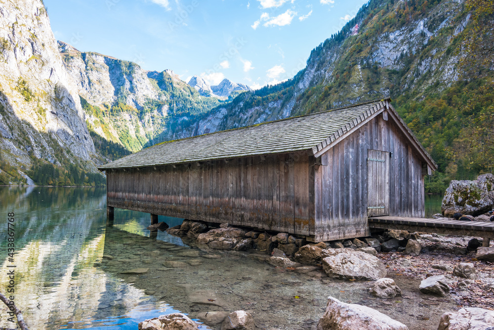 Beautiful view of a boathouse at Obersee - Schönau, Germany