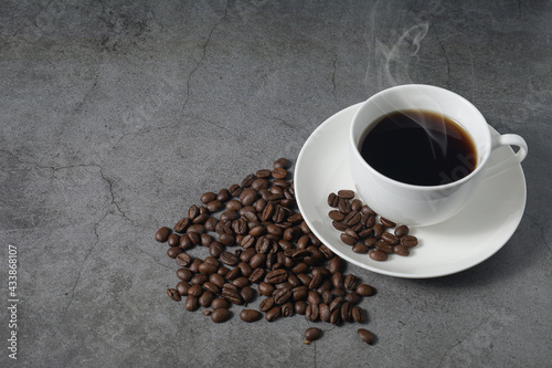 cup of coffee with beans