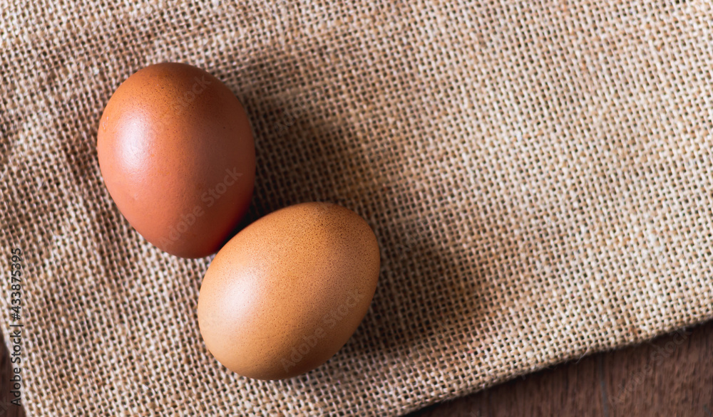 Top view of eggs on sackcloth background Top view of eggs on sackcloth background