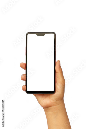 The hand is holding the white screen, the mobile phone is isolated on a white background