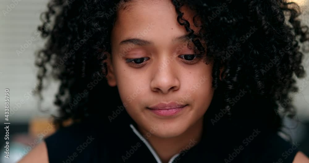 Bored Little girl rolling eyes to sky feeling annoyed eye-rolling
