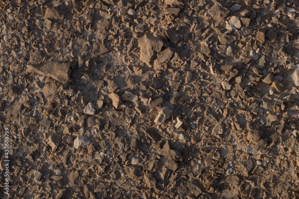 Textured surface of desert rocks and stones Textured surface of desert rocks and stones