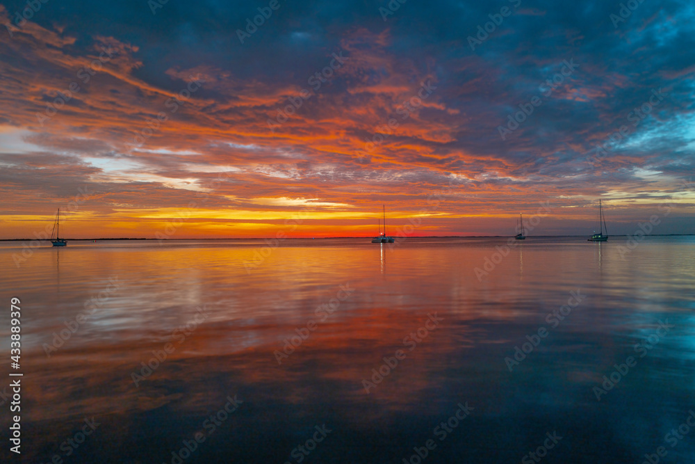 Sunset in the sea with beautiful clouds. Sunrise ocean seascape. Sunset in the sea with beautiful clouds. Sunrise ocean seascape.