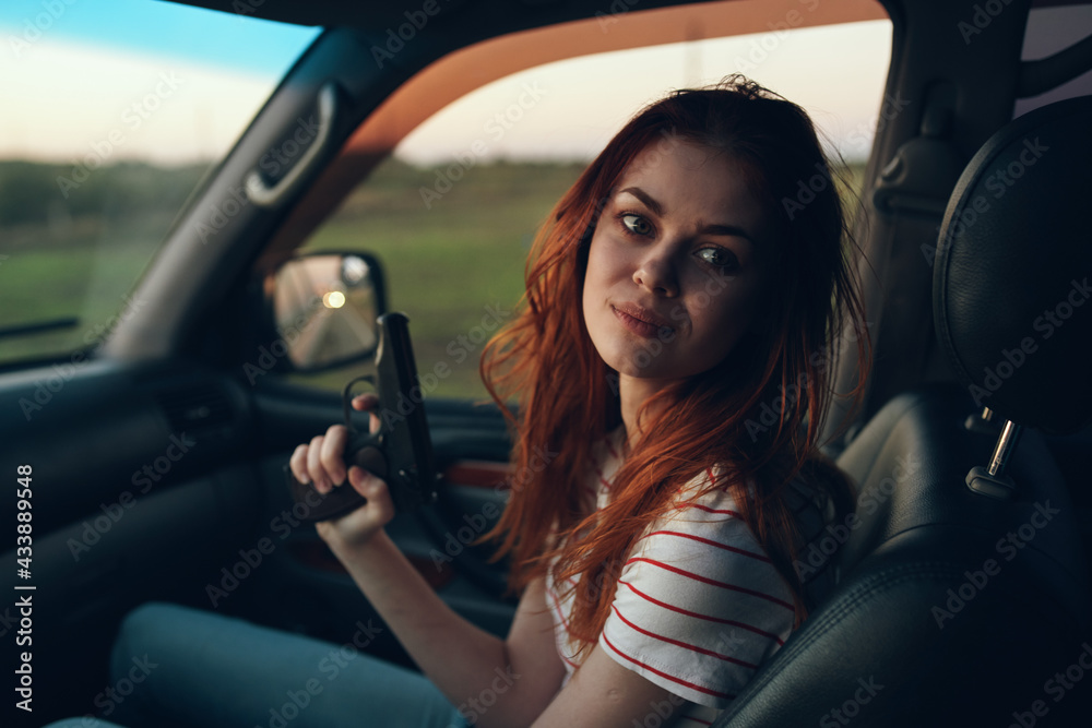 woman in car with arms in hand field landscape t-shirt model window woman in car with arms in hand field landscape t-shirt model window