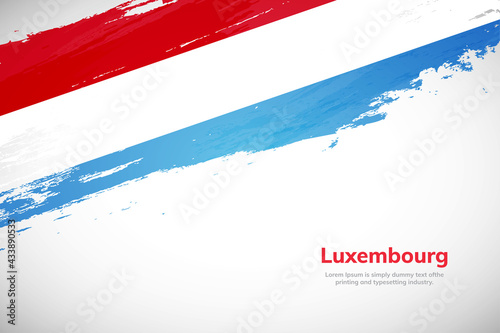 Brush painted grunge flag of Luxembourg country. Hand drawn flag style of Luxembourg. Creative brush stroke concept background