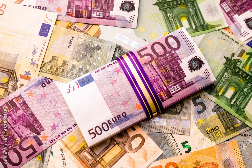 Obraz premium A pack of European currency lies on the background of the Euro 