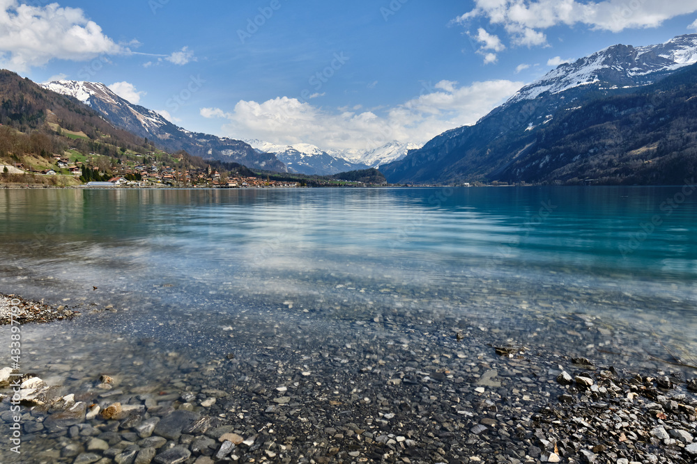 Fototapeta premium Scenic View Of Lake And Snowcapped Montains Against Sky