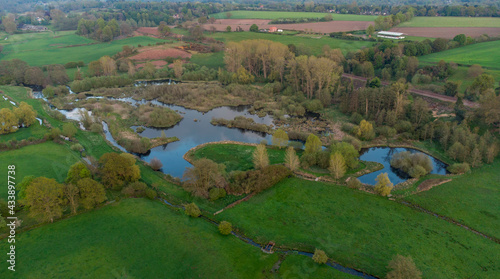 Fotografija An aerial view of a small lake in rural Suffolk, UK