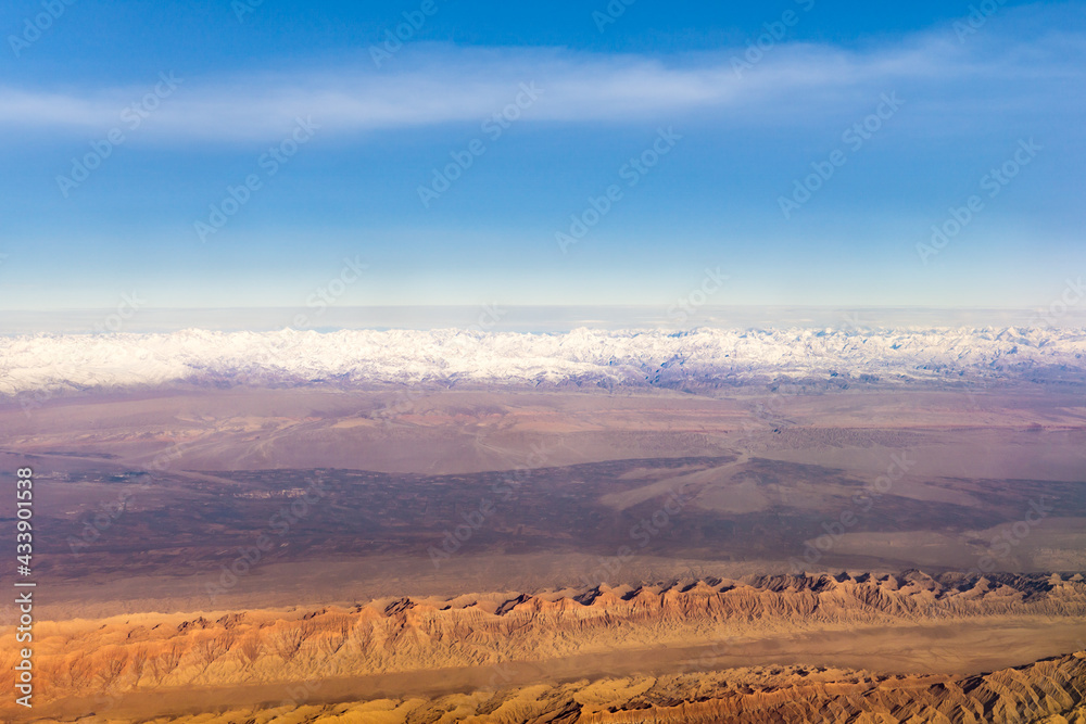 Aerial photos of Plateau and snow mountain in Xinjiang, China