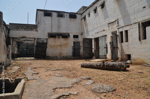An ancient cannon in the abandoned prison in the former Ussher Fort in Accra, Ghana. photo