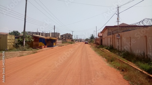 Sandy road somewhere in the city of Accra, Ghana.