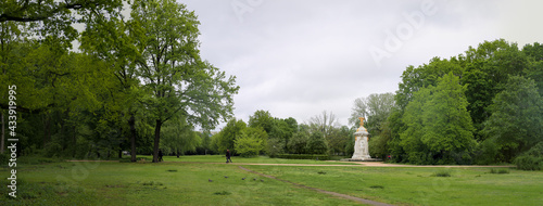 Panoramic view of Berlin Tiergarten community park with memorial statue depicting composers Mozart, Beethoven and Haydn