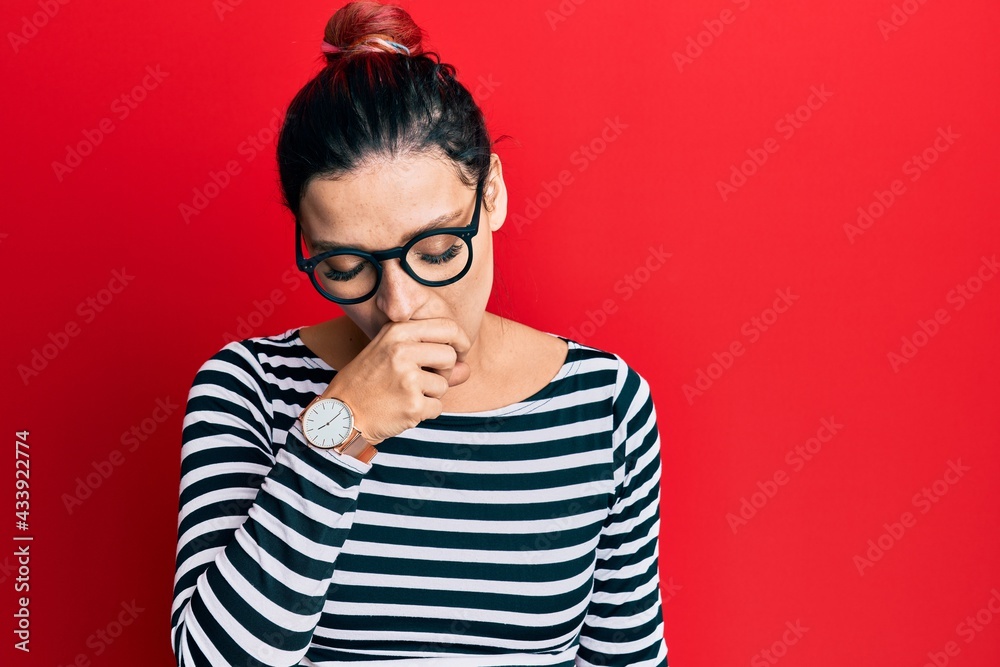Young caucasian woman wearing casual clothes and glasses feeling unwell and coughing as symptom for cold or bronchitis. health care concept.
