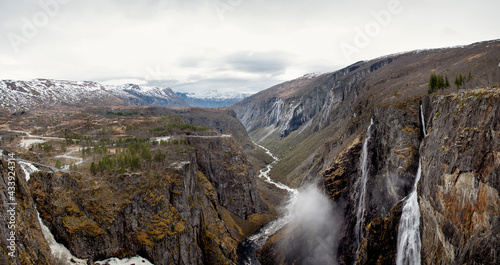 waterfall in the Norway mountains on a cloudy afternoon