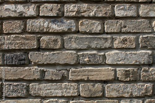 Detailed light brown brick wall