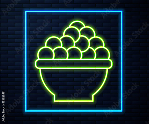 Glowing neon line Caviar icon isolated on brick wall background. Vector