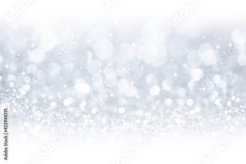 white  grey and silver blur bokeh abstract background. christmas blurred beautiful shiny Christmas lights.