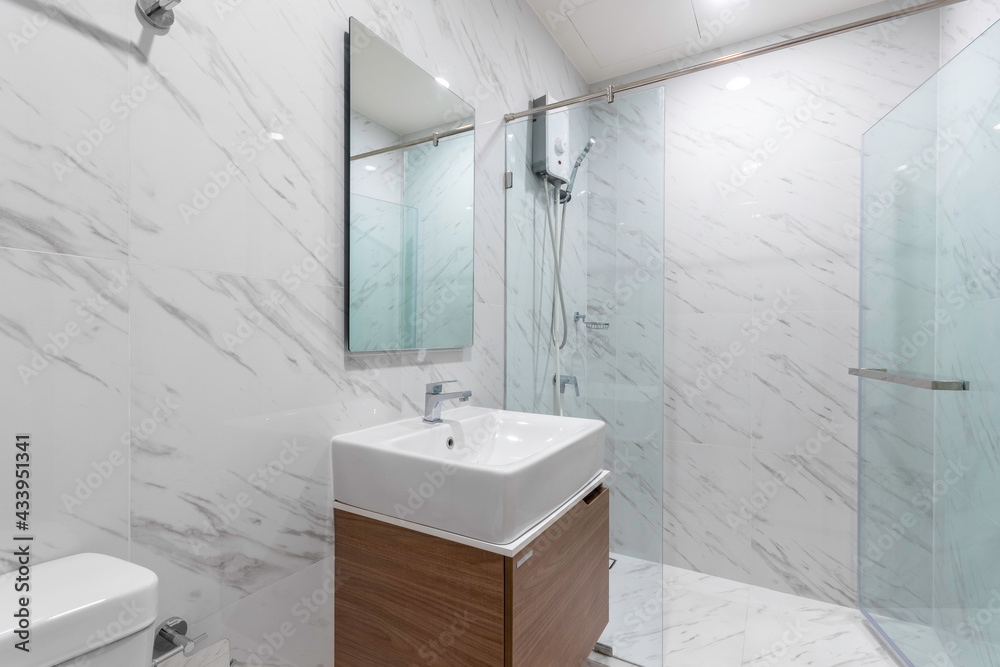 Marble bathroom with basin water Heater and Shower Cabin, decoration with  luxury marbles design in apartment Stock Photo | Adobe Stock