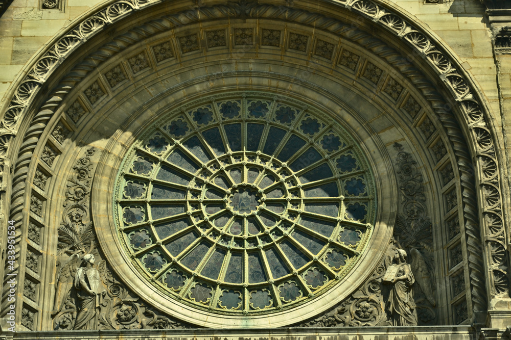 Fototapeta premium Paris, France - June 6th 2015 : The Saint-Augustin Church is a church in the 8th arrondissement of Paris, built between 1860 and 1871. Focus on the rose windows of the church.