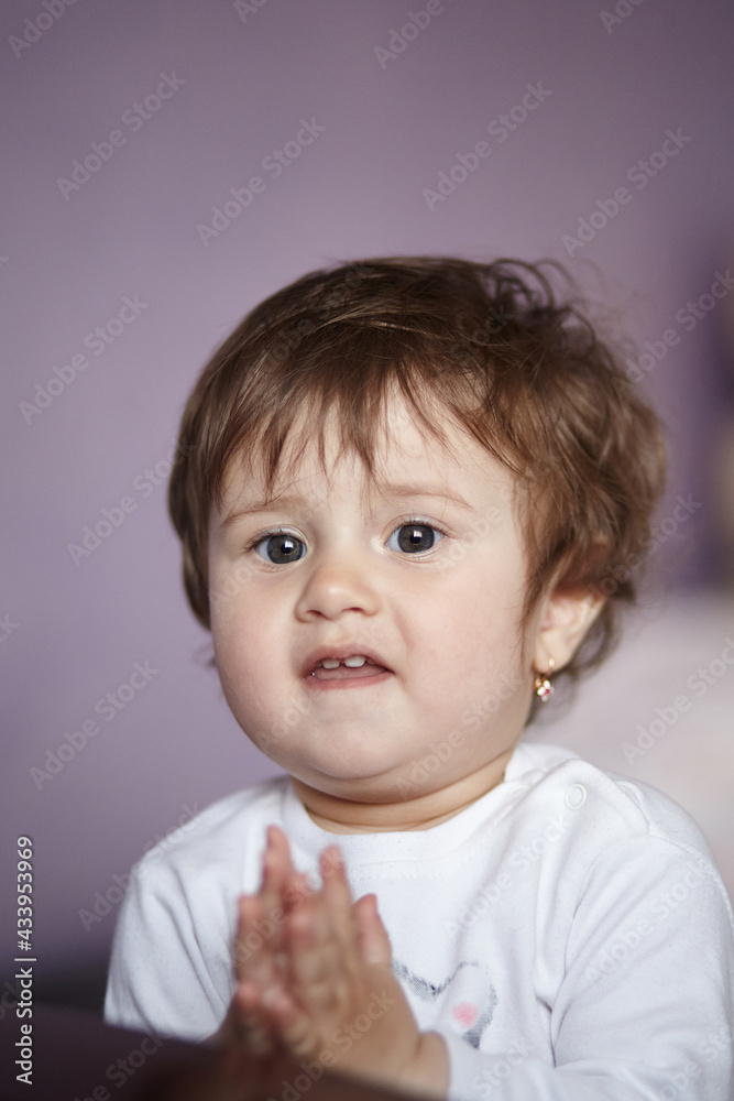 One Year Old Girl Clapping Hands. Close Portrait Cute Baby Girl. One Year Old Girl Clapping Hands. Close Portrait Cute Baby Girl.