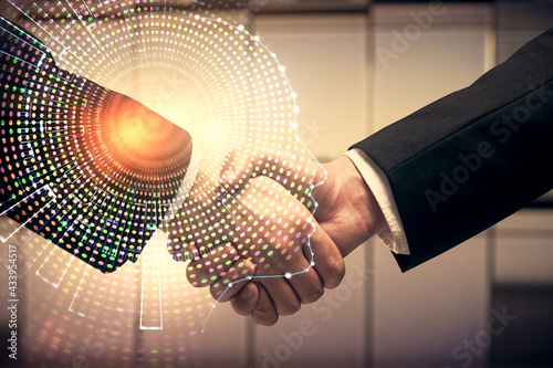 Double exposure of brain hologram and handshake of two men. Partnership in IT industry concept.