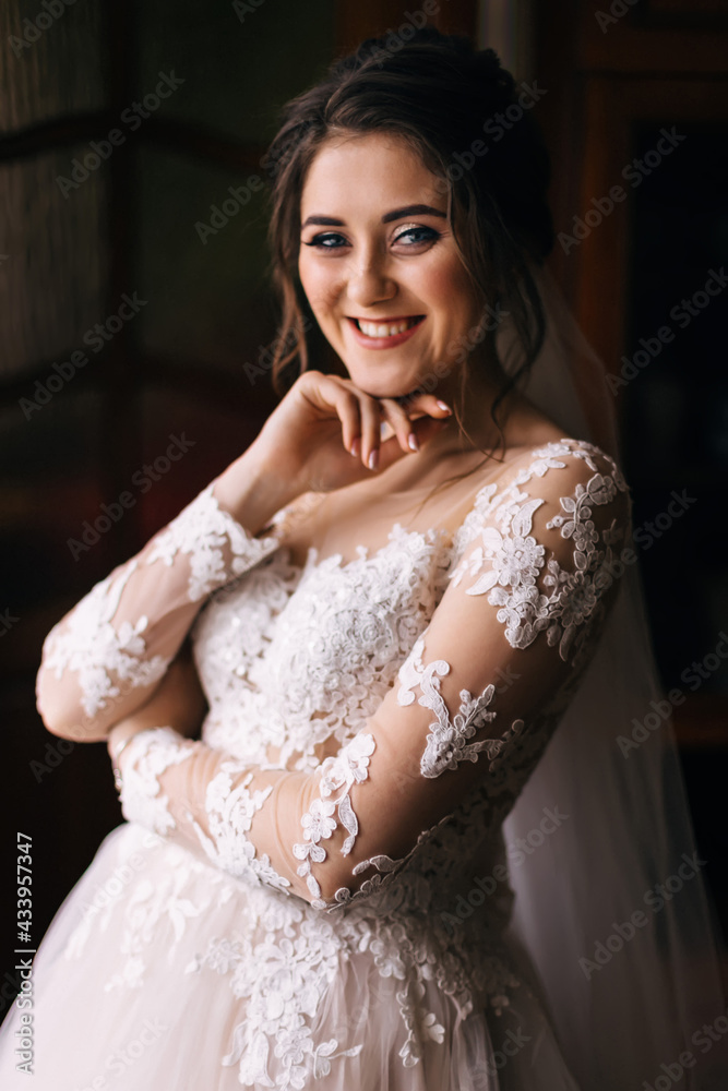 beautiful bride posing in the wedding morning room. Cheerful you