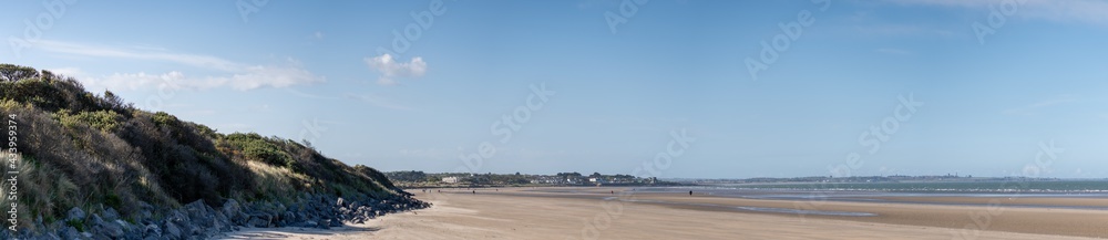 Panoramic view of Portmarnock beach, County Dublin, Ireland. Vivid colors,Copy space for text holiday background. Selective focus