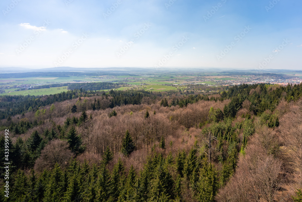 View from Jarnik tower. Auntumn color. View on medieval Town Pisek above the river Otava, Czech Republic. Landscape, trees, forest, nature, clear sky. South Bohemia.