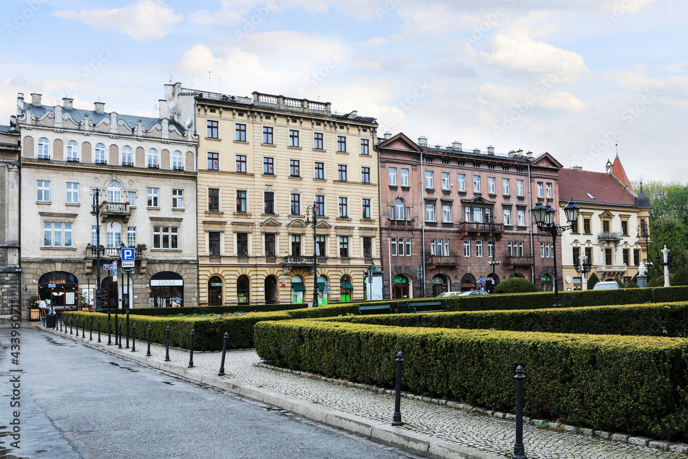 KRAKOW, POLAND - MAY 05, 2021: Old town street with ancient tenements and other monuments