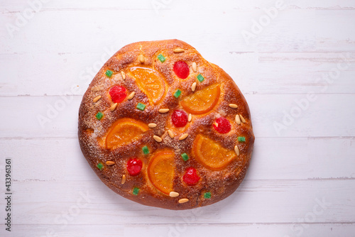 Coca de sant joan. Traditional San Juan cake to celebrate the arrival of summer in Spain made with brioche bread, candied fruit and nuts.
