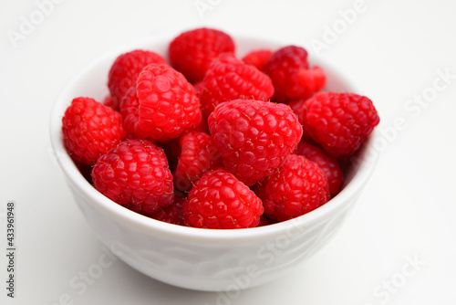 Raspberries isolated on white background. Raspberries Clipping Path. Raspberries macro studio photo. 