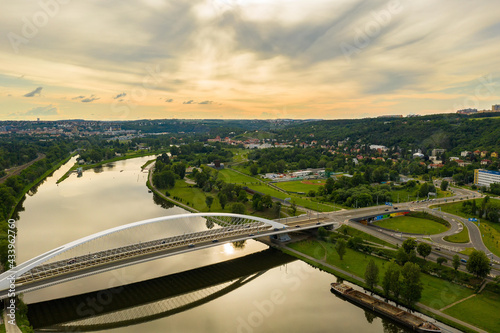 Aerial view of Prague. Troja Bridge over the river Vltava and Prague Zoo in background. White arch in Holesovice. Czech: "Trojsky most".
