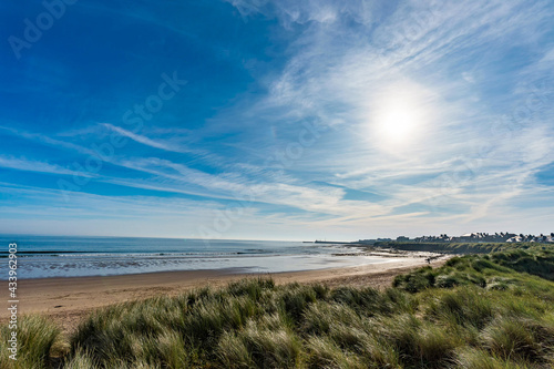 Seahouses is a large village on the North Northumberland coast in England. It is about 20 kilometres (12 mi) north of Alnwick, within the Northumberland Coast Area of Outstanding Natural Beauty.