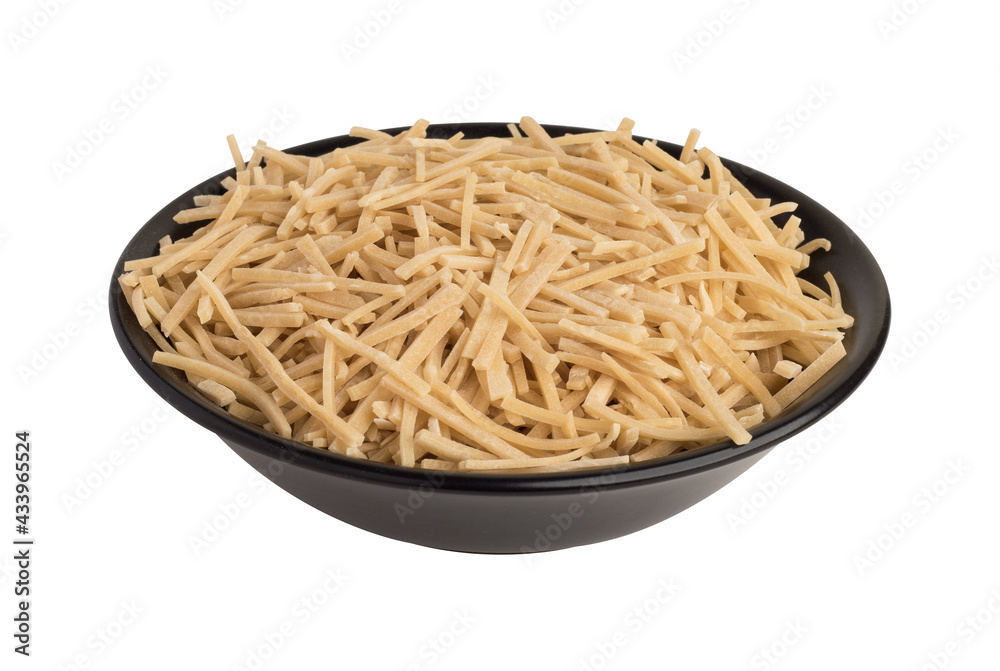 Handmade Turkish Noodles (Turkish Name: Eriste) in black plate. Erishte from Traditional Turkish Cuisine. Handmade Turkish Noodles (Turkish Name: Eriste) in black plate. Erishte from Traditional Turkish Cuisine.