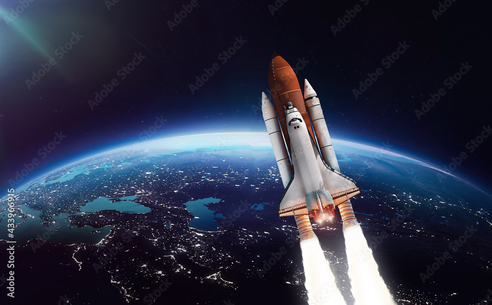 Space shuttle flight. Launch in outer space from Earth. Rocket on orbit of the planet. Spaceship and spacecraft. Elements of this image furnished by NASA Space shuttle flight. Launch in outer space from Earth. Rocket on orbit of the planet. Spaceship and spacecraft. Elements of this image furnished by NASA