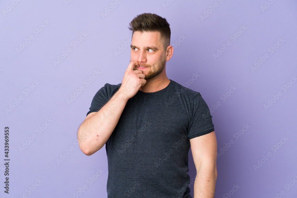Russian handsome man over isolated background nervous and scared Russian handsome man over isolated background nervous and scared
