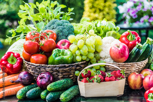 Variety of fresh organic vegetables and fruits in the garden