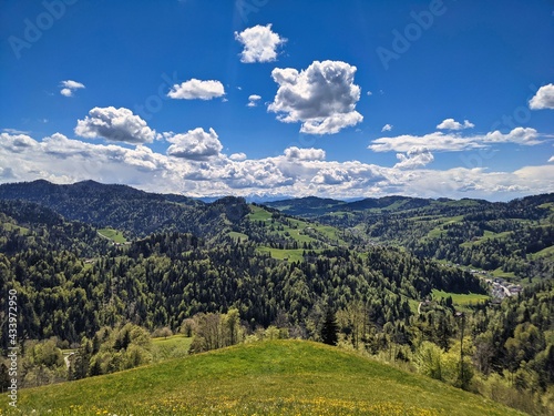 View in the Zurich Oberland of the surrounding hills in this beautiful spring season. foresight in the mountains. Steg
