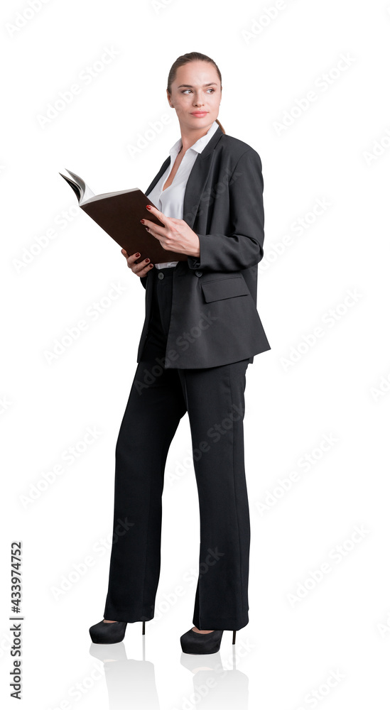 Attractive business woman in formal suit is holding a planner, notebook or her notes. Full length businesswoman Isolated over white background Attractive business woman in formal suit is holding a planner, notebook or her notes. Full length businesswoman Isolated over white background