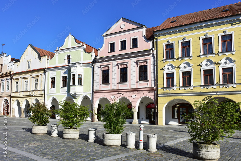 facades of historic houses in square of town Trebon in Czech republic