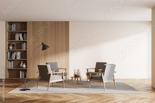 Modern design living room interior. Bookshelfs with books  wooden floor. Mock up copy space white wall. 3d rendering.