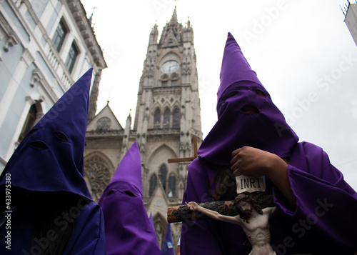 Manifestación religiosa en semana santa en Ecuador con los Cucuruchos en procesión photo