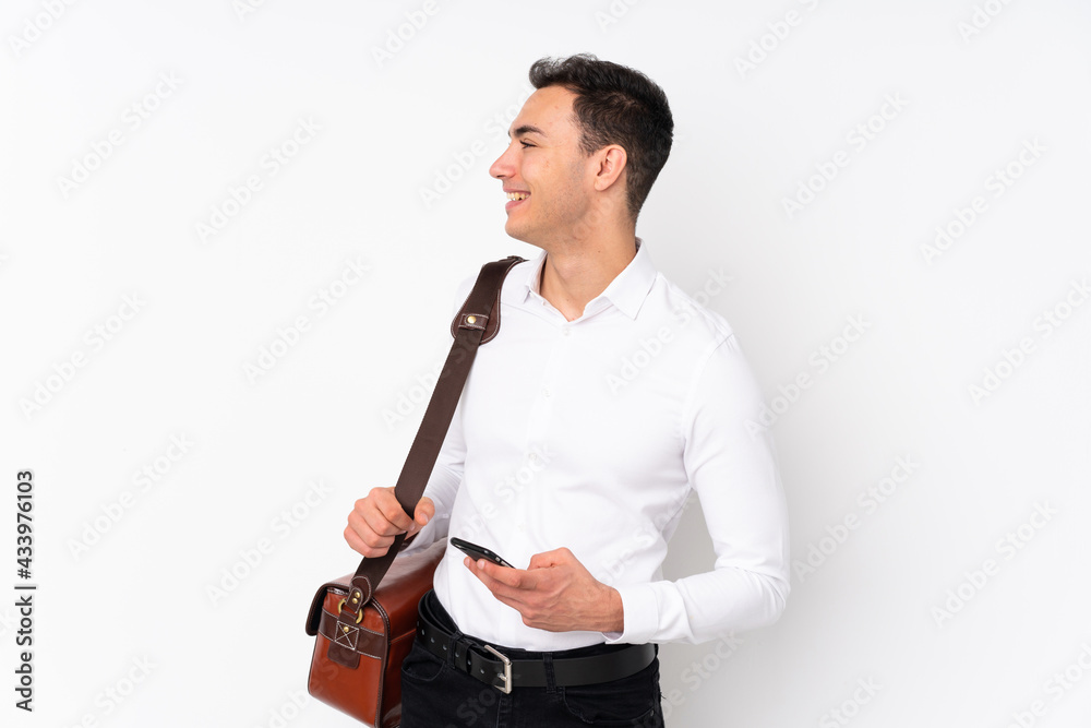Young handsome businessman on isolated background happy and smiling Young handsome businessman on isolated background happy and smiling