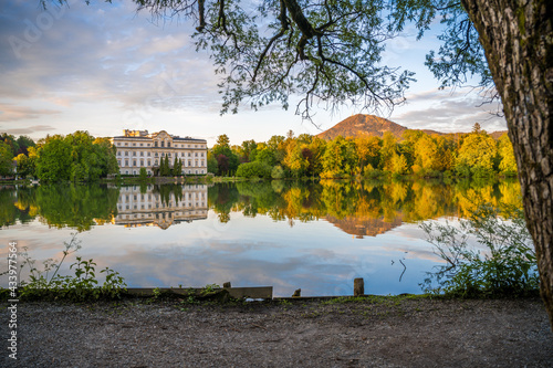 spring landscape with pond and trees Lake Leopoldskroner Weiher Castle Fortres Salzburg