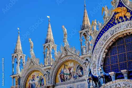 Architectural fragment of the facade of Patriarchal Cathedral Basilica of Saint Mark at Piazza San Marco, Venice, Italy.