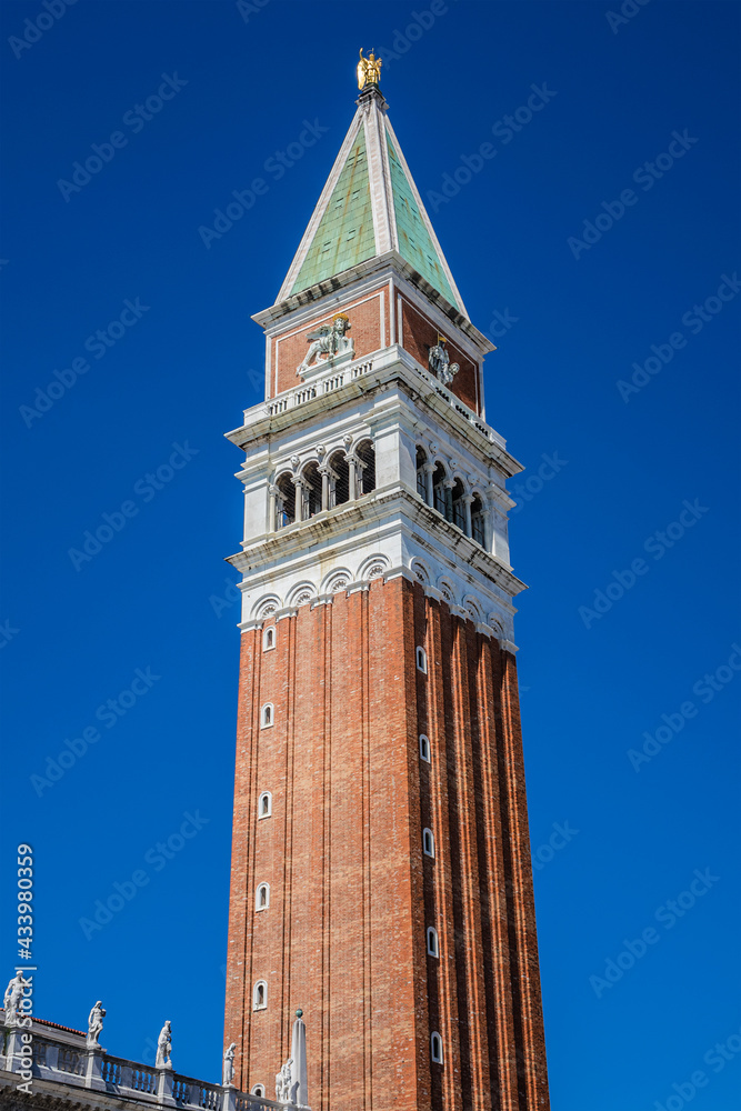 98.6 meters St Mark's Campanile (Campanile di San Marco, ninth century) - famous bell tower of St Mark's Basilica. Piazza San Marco, Venice, Italy.